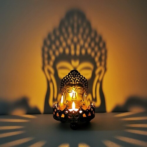 Art Buddha Candlestick Oil Lamp Buddha Sitting on Lotus Feature Art Hollow Metal Candle Holder Carving Light and Shadow